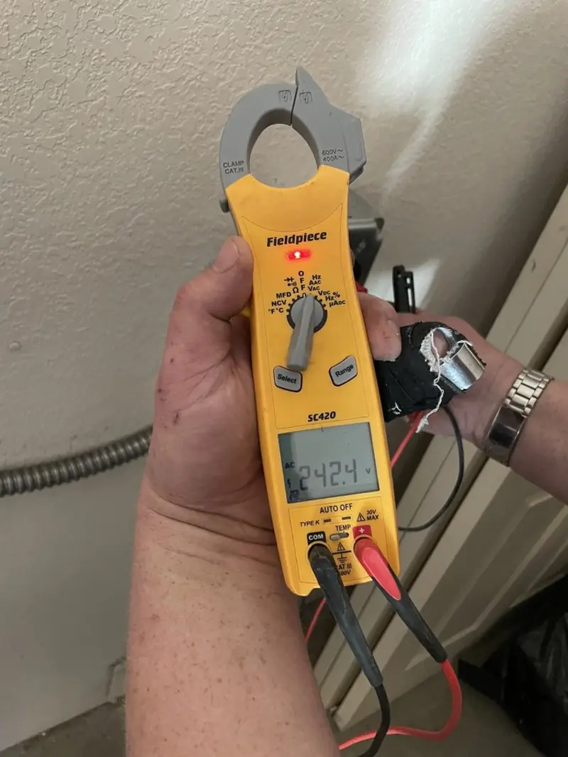 Voltage testing with clamp meter during Generator Installation in Weare
